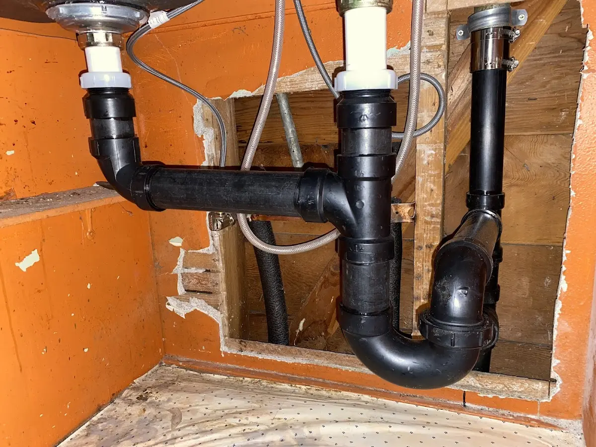 Professional Garbage Disposal Repair equipment and tools on the job in Lyman